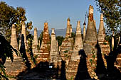 Inle Lake Myanmar. Indein, on the summit of a hill the  Shwe Inn Thein Paya a cluster of hundreds of ancient stupas. Many of them are ruined and overgrown with bushes.